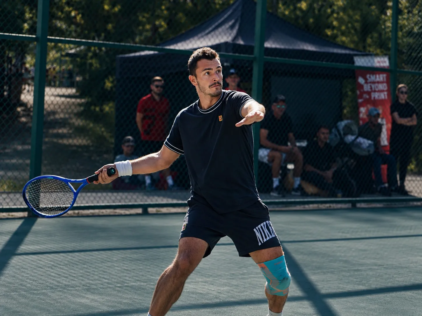 Viktor playing tennis